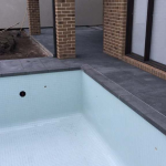 best midnight black granite pool side paving Melbourne