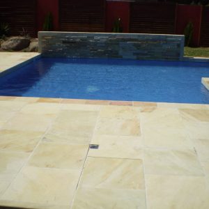 Natural suede sand poolside paving