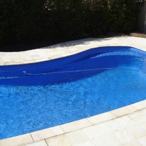 Natural suede sand paving swimming pool look