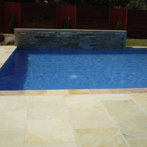 Natural suede sand poolside coping